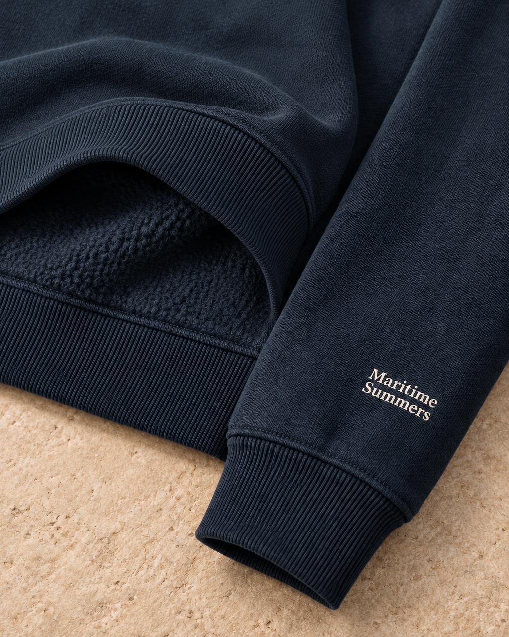 Navy sleeve with Maritime Summers print above the ribbed cuff, and brushed interior lining